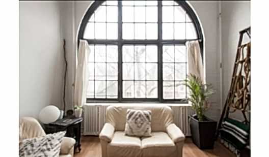 plush74 large bright loft with arched window toronto 2